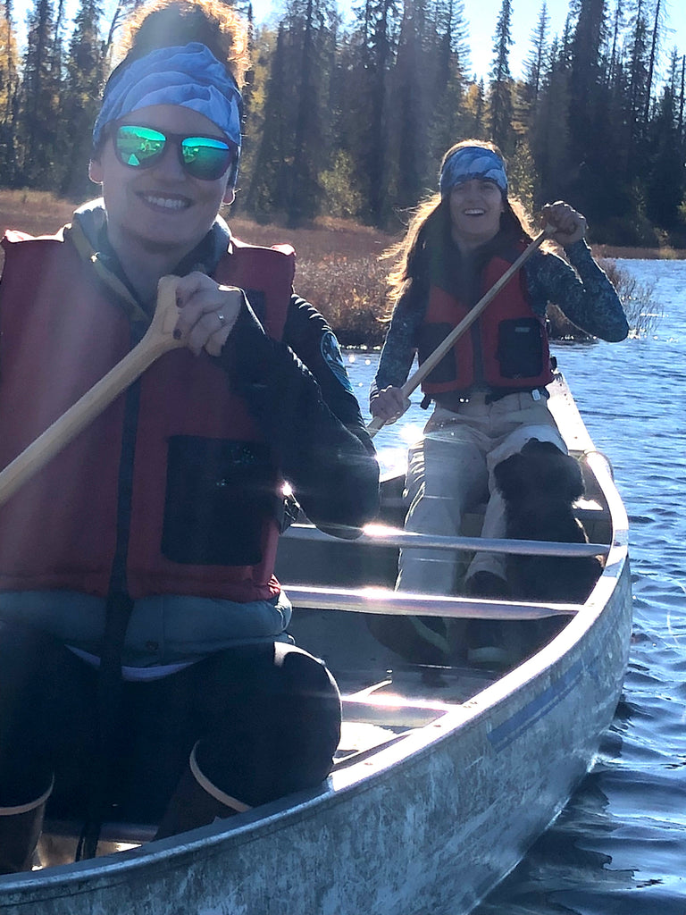 Wonderful friends wearing Turnagain Pass Skiing Map Buff while canoeing